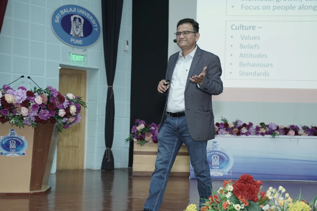 The guest Mr. Rajendra Lingwal engaging with students during an interactive session